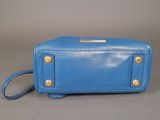 michael korsch blue leather cross body bag with gold hardware