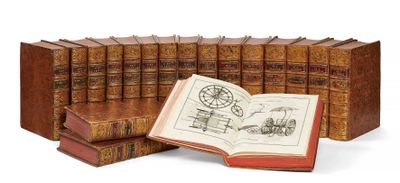 plusieurs vieux livres sont empilés sur une surface blanche