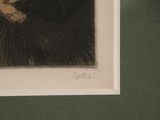 a picture of a cat that is sitting on a table