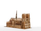 a wooden model of a cathedral with a steeple