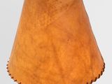an image of a lamp with a wooden shade on top of it