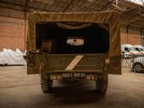 a military vehicle that is parked in a building