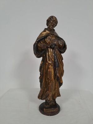 statue of a woman holding a baby in her arms