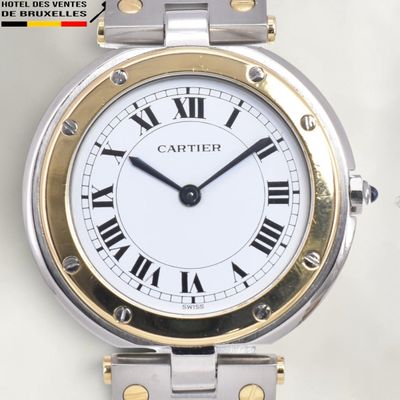 an image of a close up of a wrist watch with roman numerals