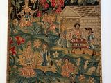 an old tapestry with a painting of people in a garden