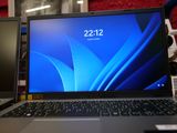 two laptops that are sitting on a table