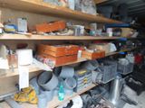 many items on the shelves in the garage