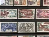 the stamps are all different colors and sizes on a black background