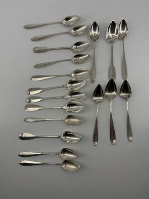 a lot of spoons and spoon spoons on the table