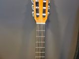 a guitar that is sitting on top of a table