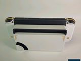 the back of a white box with a black handle and a black handle