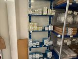 a rack with many items on it in a store