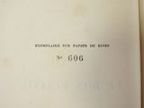 a close up of an open book with writing on it