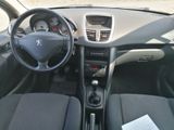 a dashboard of a small car with a steering wheel