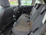 the interior of a car with the front seats folded down