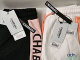 a close up of a pair of pants with tags on them
