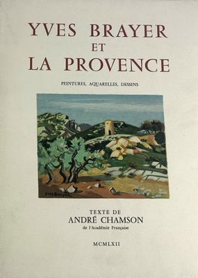 un livre sur la couverture duquel figure une image représentant un paysage