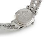 an image of a close up of a wrist watch on a white surface