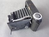 an old camera that is sitting on a table