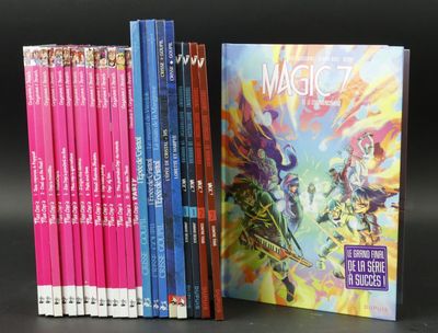 a lot of books that are sitting on a table