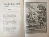an open book with a picture of a man on a horse