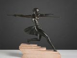 bronze statue of a woman holding a spear on a marble base