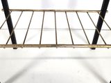 a metal shelf that has a shelf on top of it