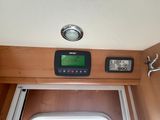a picture of a microwave with a green screen on top of it