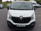 a white van that is parked in a parking lot