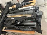 many umbrellas that are sitting on a table