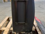 an image of a tv sitting on a pallet
