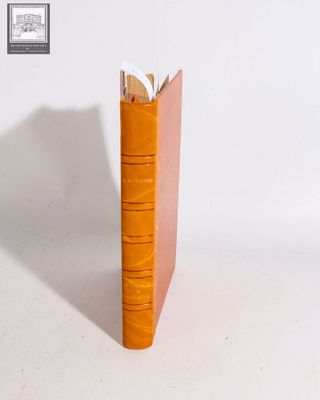 a book that is sitting on a white table
