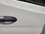 a close up of a door handle on a white car