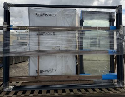 a pallet with several boxes on it sitting on a pallet