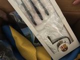 a box with a pair of gloves and a pair of gloves