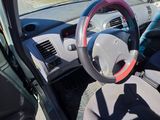 dashboard of a car with a steering wheel and a steering wheel cover