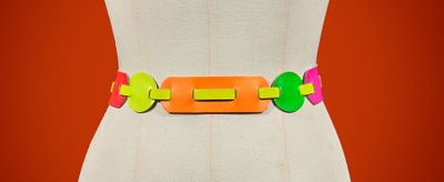 a close up of a mannequin torso with a colorful belt
