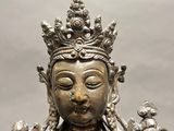 an image of a statue of a woman with a crown on her head