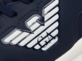 embossed logo on the upper part of a sneaker