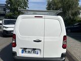 a white van parked on the side of the road