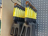a lot of plastic utensils on display in a store
