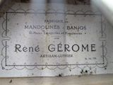 a sign on the side of a building that says rene gerome