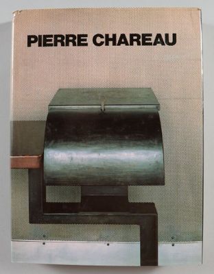 un livre sur lequel figure l'image d'un objet en métal