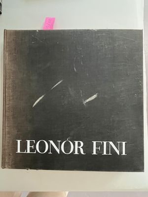 someone is holding a book with the title leonor fini on it