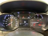a close up of a car dashboard with a speedometer and gauges