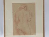 an image of a drawing of a nude woman in a wooden frame