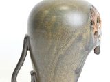 an elephant shaped vase with a handle on a white background