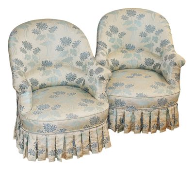 Paire de FAUTEILS crapauds garnie de tissu à décor floral ja…