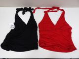 pair of red and black swimsuits on a white table
