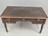 an old wooden desk with two drawers and a drawer underneath it